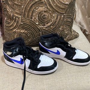 Blue and Black Air Jordan. Worn twice. Youth size 7.